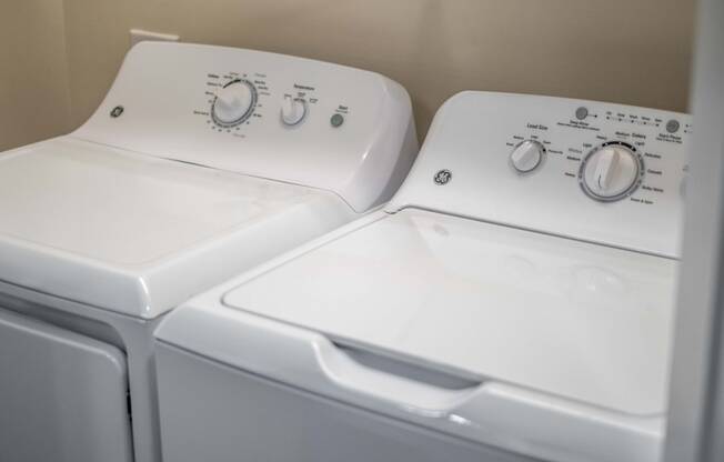 Stacked Washer/Dryer at Abberly CenterPointe Apartment Homes by HHHunt, Virginia