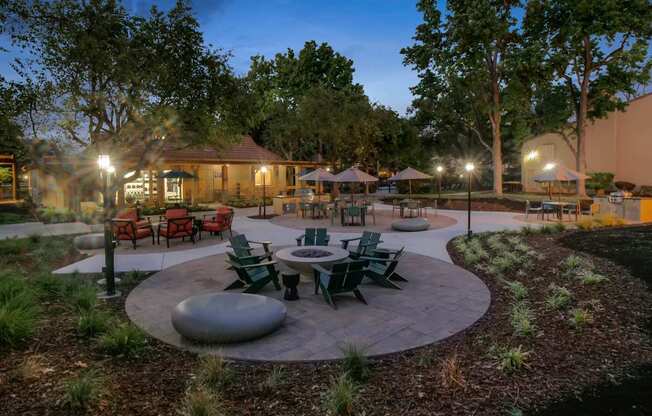a patio with tables and chairs at Summerwood Apartments, Santa Clara, CA 95050
