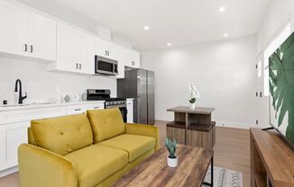 A 3 Bedroom apartment with Private Ensuite Bathrooms, common areas and a fully functional kitchen at 1736 Kelton Ave.