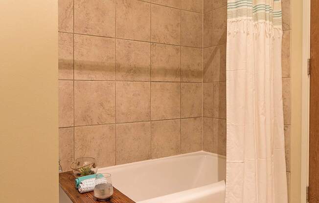 A bathroom with a Bathtub at Grand Wisconsin, Milwaukee, 53203