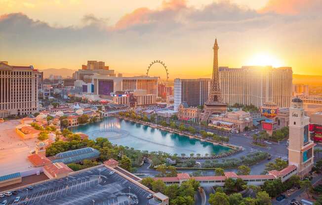 an aerial view of the city at sunset