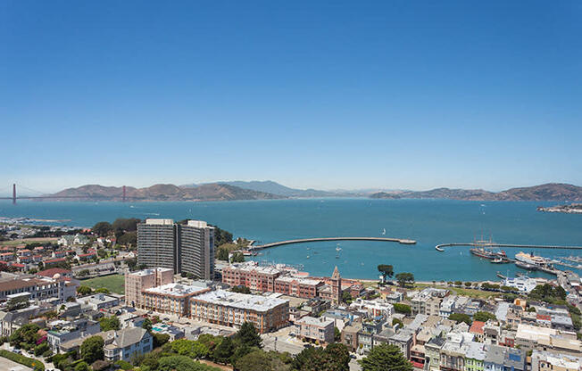 a view of the city of san francisco with the golden gate bridge in the background