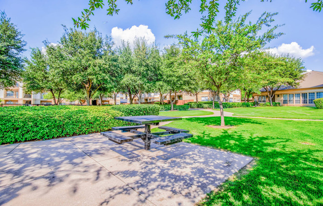 Huge courtyard with BBQ Grills at Tuscany Square Apartments in North Dallas, TX. Now leasing studios, 1 and 2 bedroom apartments.