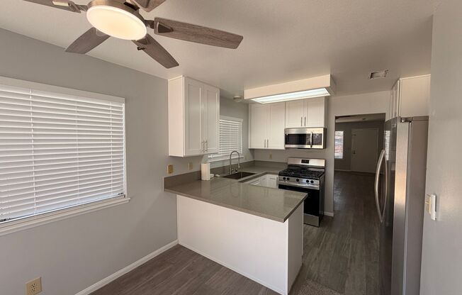 Welcome to this charming single-story home located in the Sunrise Manor!