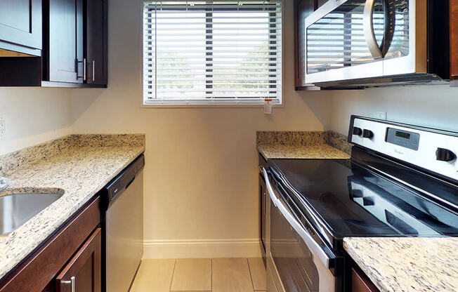 Interior view of kitchen in apartment unit for bren mar