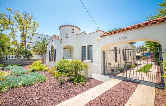 Spanish Style 3 Bed/2 Bath Home w/ Modern Upgrades & Unique Touches ~ W/D Included!