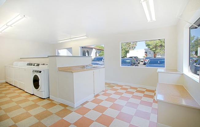 a laundry room with a washer and dryer