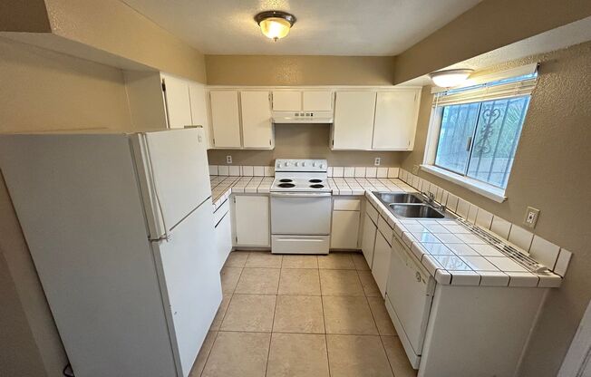 Beautiful 2-Bedroom Townhome with Open Floorplan & Private Patio!