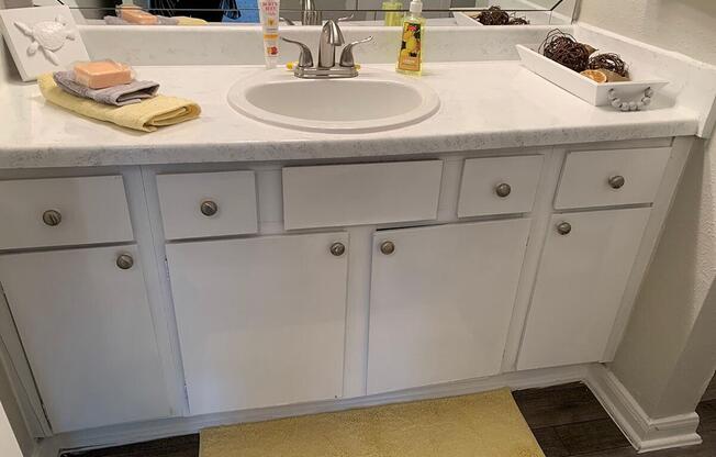 a kitchen with a sink and a counter