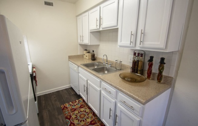 This is a photo of the kitchen in the 653 square foot 1 bedroom apartment at Princeton Court Apartments in Dallas, TX.