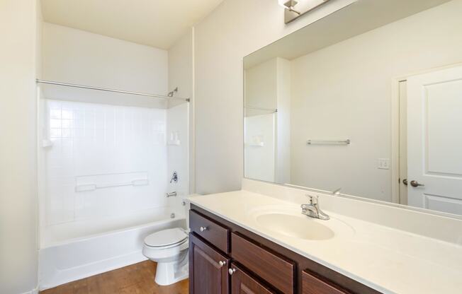 Freshly renovated bathroom with plenty of counter space.