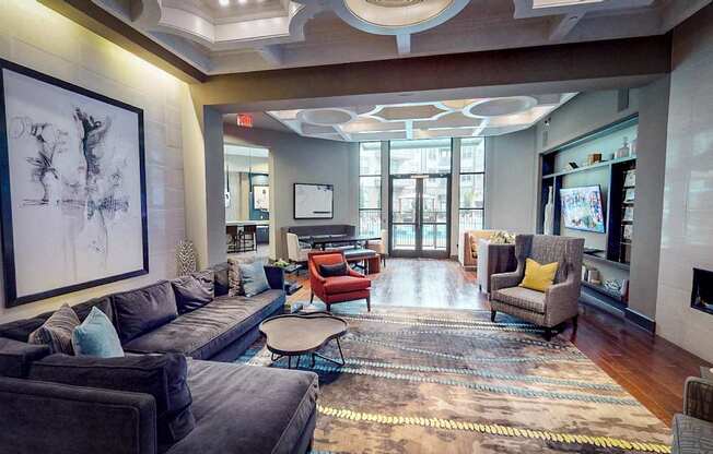 Clubroom With Smart Tv And Fireplace at Civic at Frisco Square Apartments, Frisco, TX