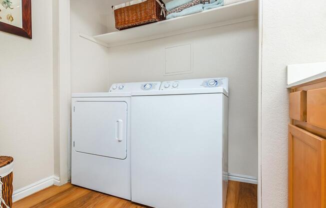 a white refrigerator freezer sitting inside of a kitchen