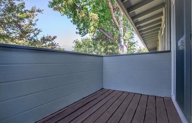 a house with trees in the background