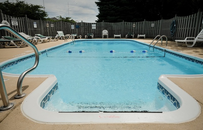 sparkling clean pool, crystal clear water, blue water, summer outdoor pool, at Regency Apartments in Bettendorf Iowa