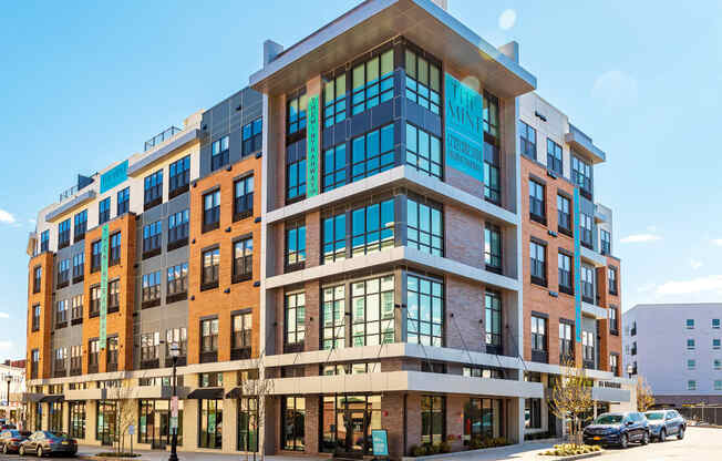 The Mint Rahway building exterior, a modern and stylish luxury apartment rental community, conveniently located near local amenities.