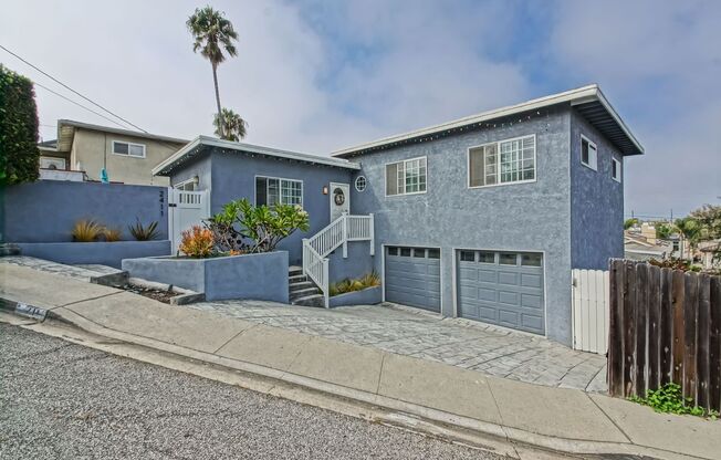 VERY CHARMING, BRIGHT & AIRY HILLTOP HOME W/ CITY VIEWS, SPACIOUS FENCED FRONT PATIO, LARGE REAR YARD & GARAGE W/ 1-CAR PARKING & BONUS SPACE NEAR PARKS, SCHOOLS & 5 MINS TO BEACH!