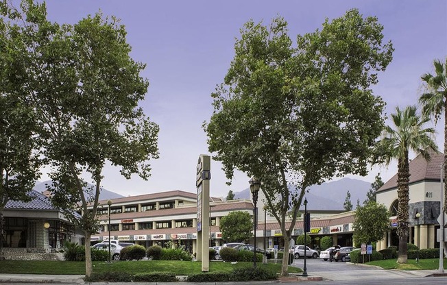 a building with a clock in front of it