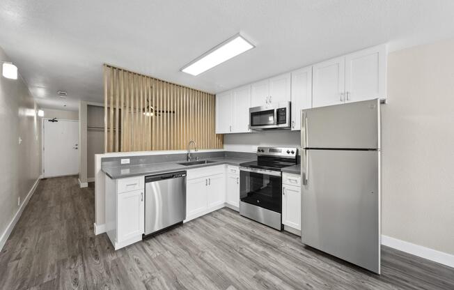 Studio Kitchen w/ Stainless Appliances