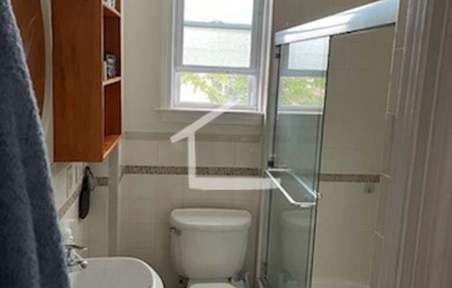 Parking Included, In Unit Washer and Dryer, Steps from the T Stop, two Full Bathrooms