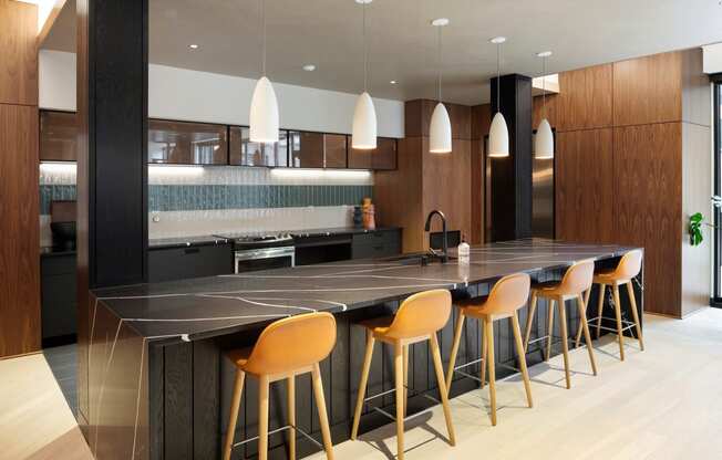 community room island seating at The Hill Apartments, Minnesota