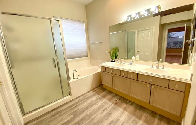 Single story home in guard gated Rhodes Ranch Community with an open kitchen in a great room, a large backyard with a covered patio, and all hard flooring throughout(tile & LVP). Community amenities available to tenants such as the club house, gym, basket