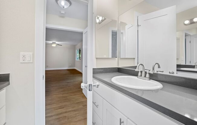 Upgraded cabinets and countertops Marina Del Rey Apartments bathroom.
