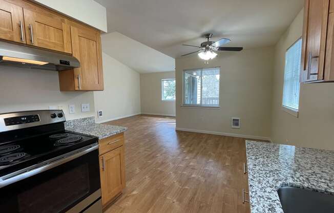 a kitchen and living room in a house