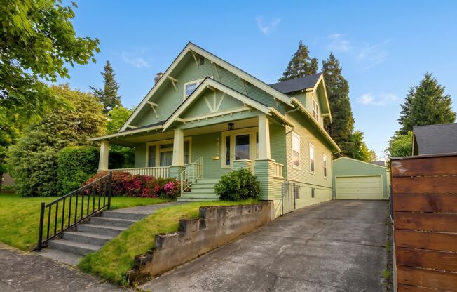 **Half Off the First Full Month of Rent!** Gorgeous Craftsman-Style 5 Bedroom Home Located in the Sought After Roseway Neighborhood!