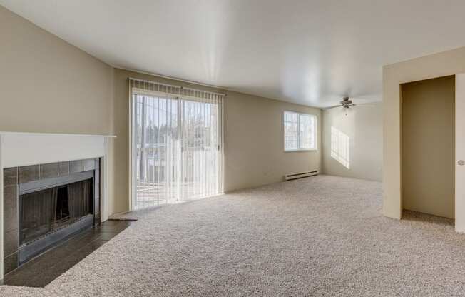 Mirabella Apartments in Everett, Washington Living Room with Fireplace and Private Patio