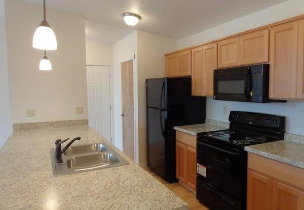 updated kitchen with black appliances