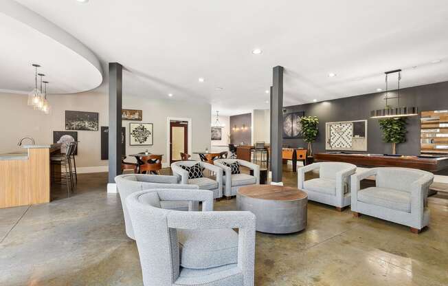 social lounge with comfortable seating and conversation areas at Sorelle apartments