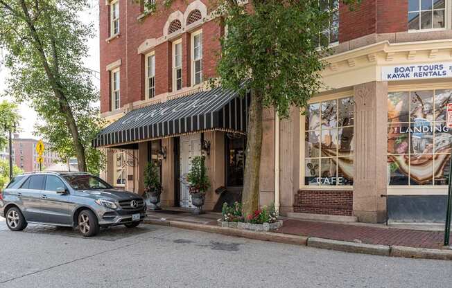 The storefront of a Cafe and boat rental building, kayak tours of providence