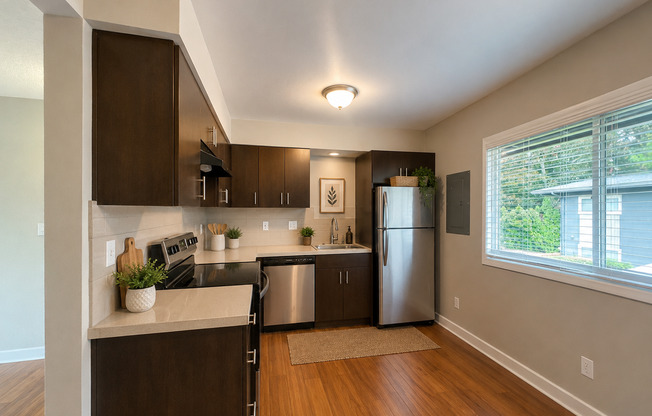Rare Opportunity! Renovated Ground-Floor 2 Bedroom with a Huge Private Fenced Yard!