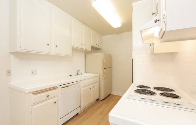 Kitchen with White Appliances and White Cabinets