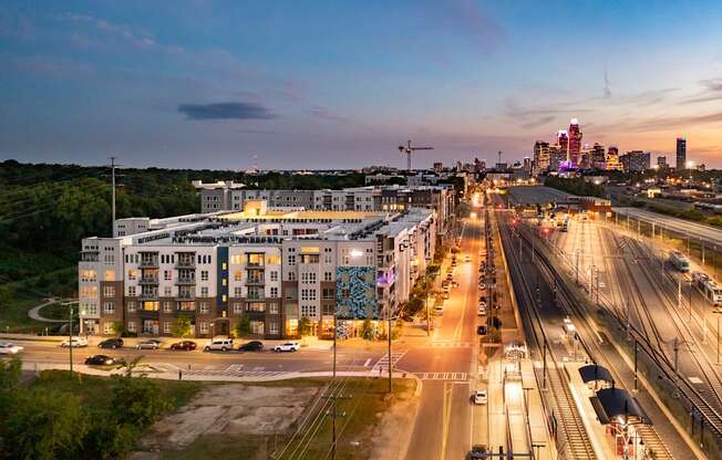 an aerial view of a city at night  at Abberly Noda Vista Apartment Homes, North Carolina