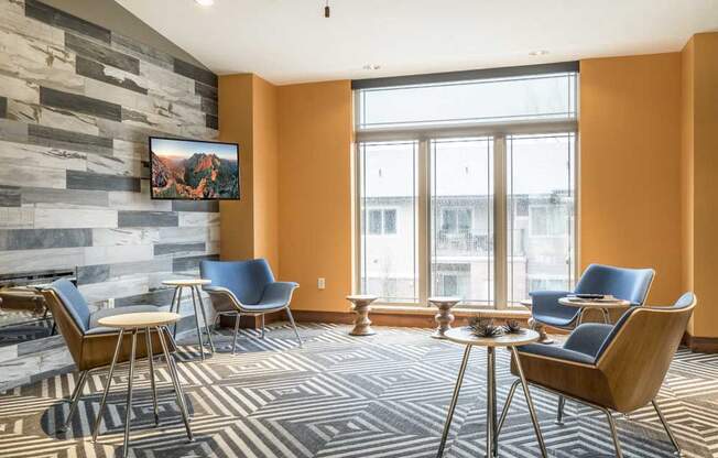 Leasing lounge with TV at Villas of Omaha townhome apartments in northwest Omaha NE 68116