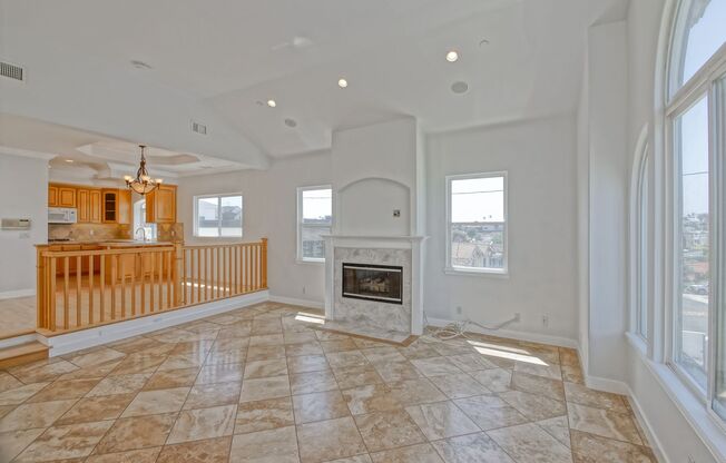 VERY BRIGHT, SPACIOUS & AIRY GOLDEN HILLS HOME NEAR HB BORDER, LARGE ENCLOSED REAR BALCONY, PATIO & 2-CAR GARAGE ON ONE-WAY STREET NEAR PARKS, SCHOOL & 2 MINS TO BEACH!