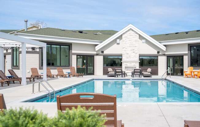 A house with a pool in the backyard.