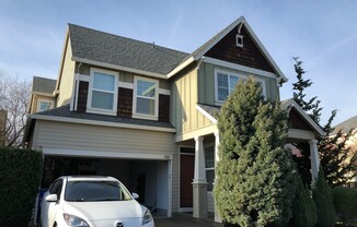 Charming Home in Orenco Gardens with Covered Front Porch and Great Floor Plan!