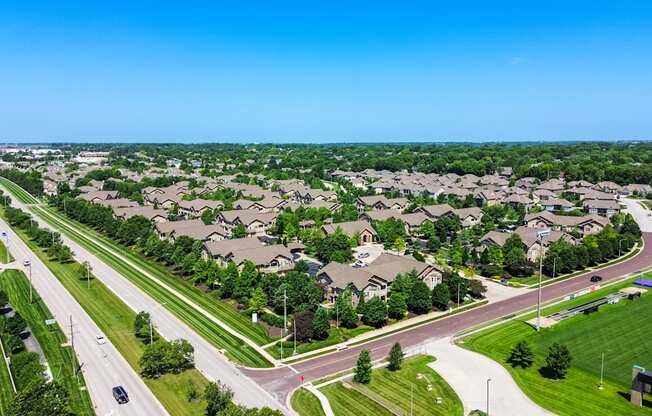 A suburban area with a road running through it.