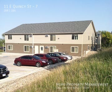 11 E QUINCY ST