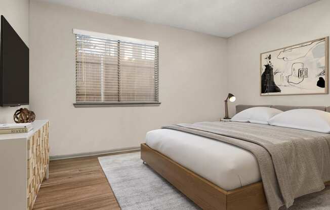 a bedroom with a bed and a window at South Lamar Village, Austin, 78704