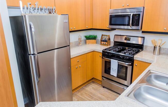 Fully Equipped Kitchen With Modern Appliances at Medici Apartment Homes, Bermuda Dunes, CA, 92203