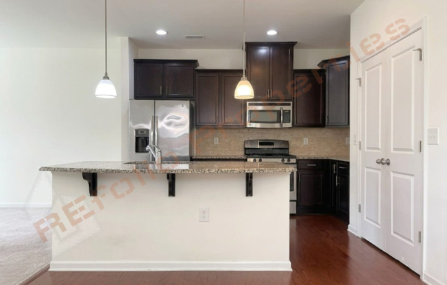 Beautiful 2-Story End-Unit Townhome with 3 Bedrooms, 1-Car Garage & Community Pool in 55 James at Midtown, Apex – Available Now!