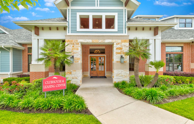 a house with a sign in front of it