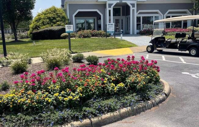 a house with a golf cart parked in front of it