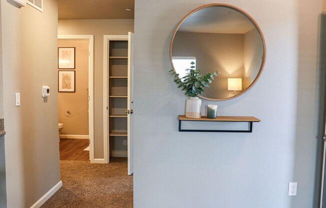a room with a sink and a mirror