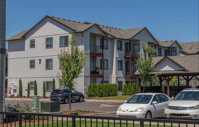 A row of townhouses with cars parked in front at Northplace Apartment Homes, Salem, Oregon