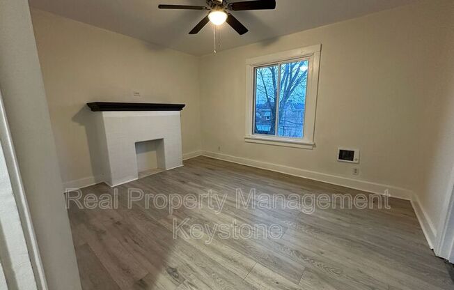 122 E 16 AVE